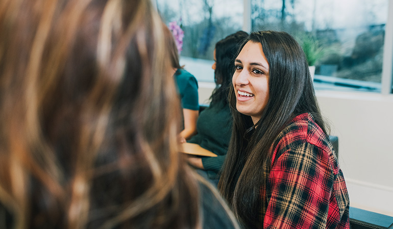 Woman talking to another woman in a group session at The Counseling Center at Middlesex